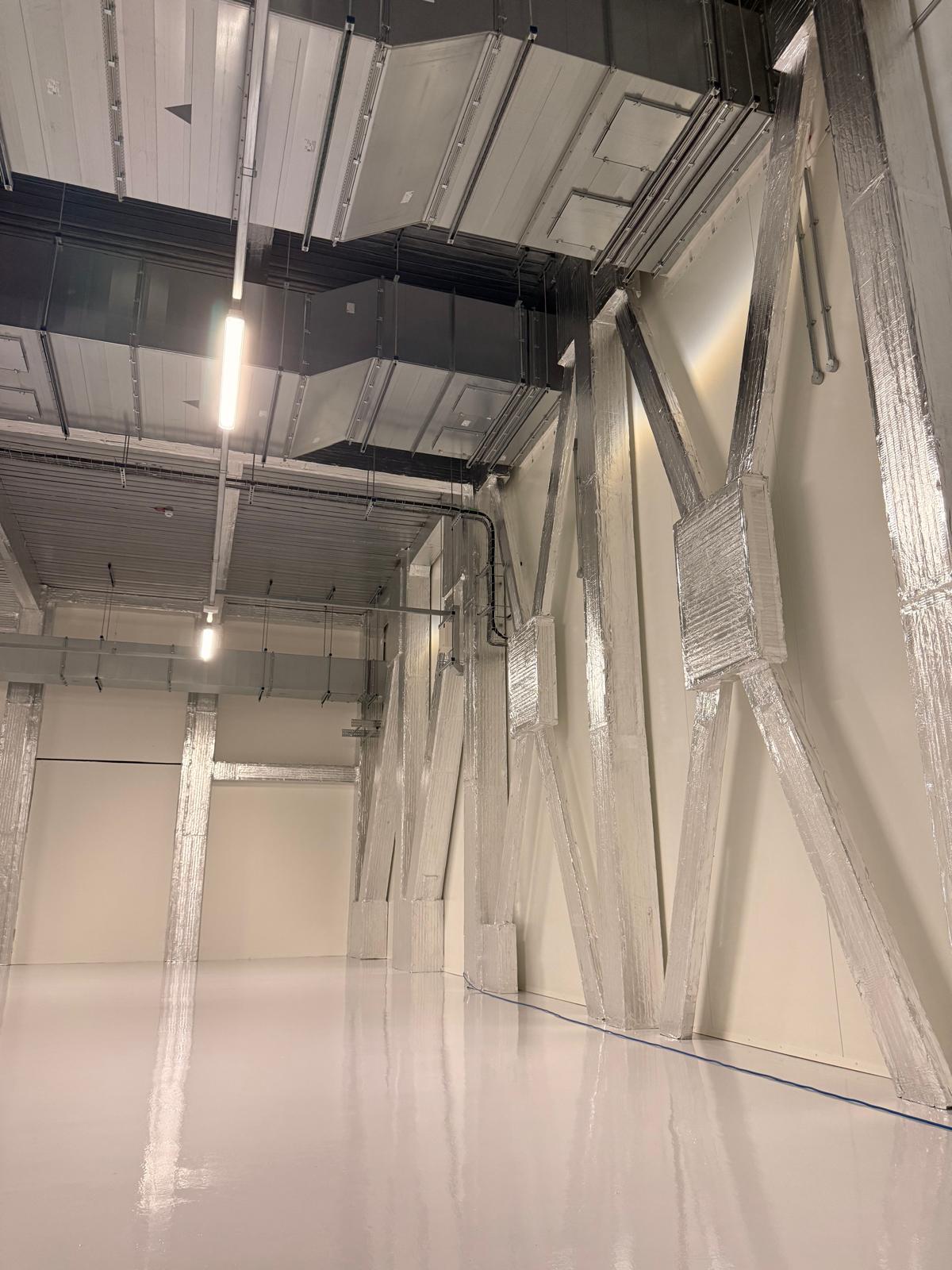 Fire stopping around electrical services for projects in Urmston