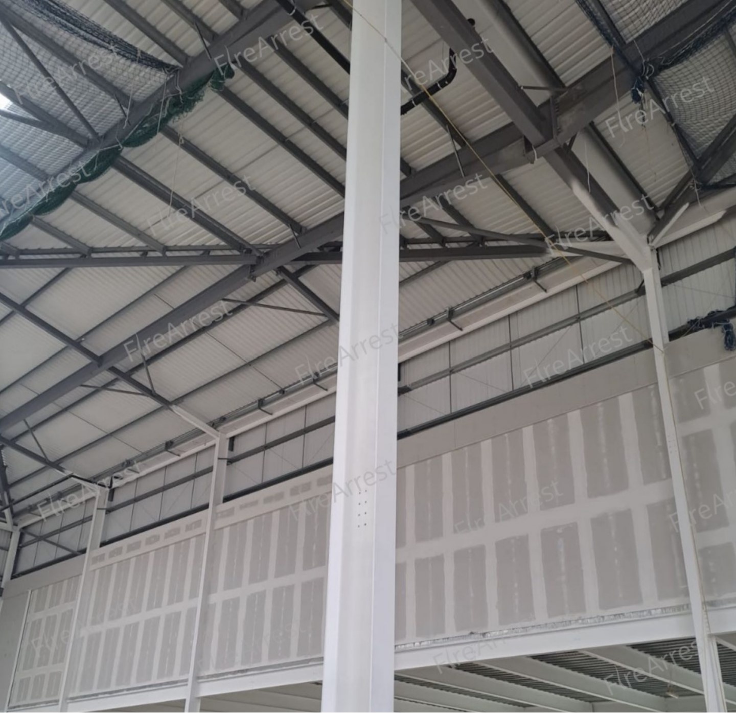 Intumescent coating applied to structural steel columns and beams
